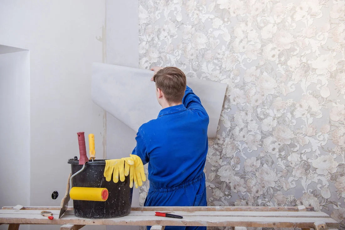 Professional wallpaper removal in progress